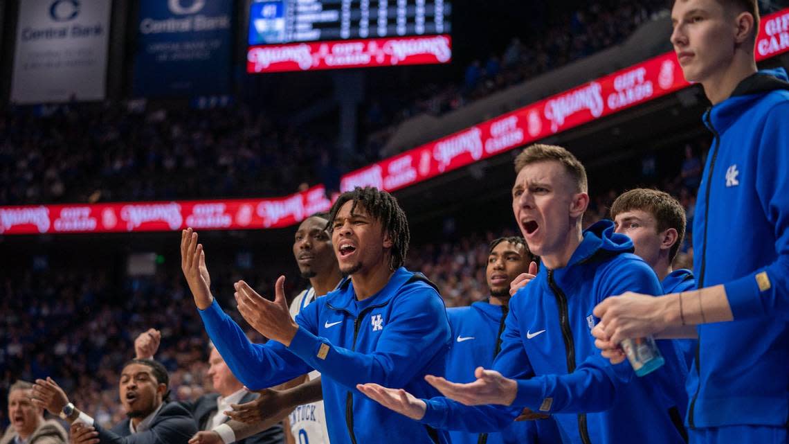 D.J. Wagner, left, and teammate Brennan Canada reacted to a play in Kentucky’s 80-73 loss to UNC Wilmington on Saturday. Wagner missed the game with an injured ankle. Mark Mahan