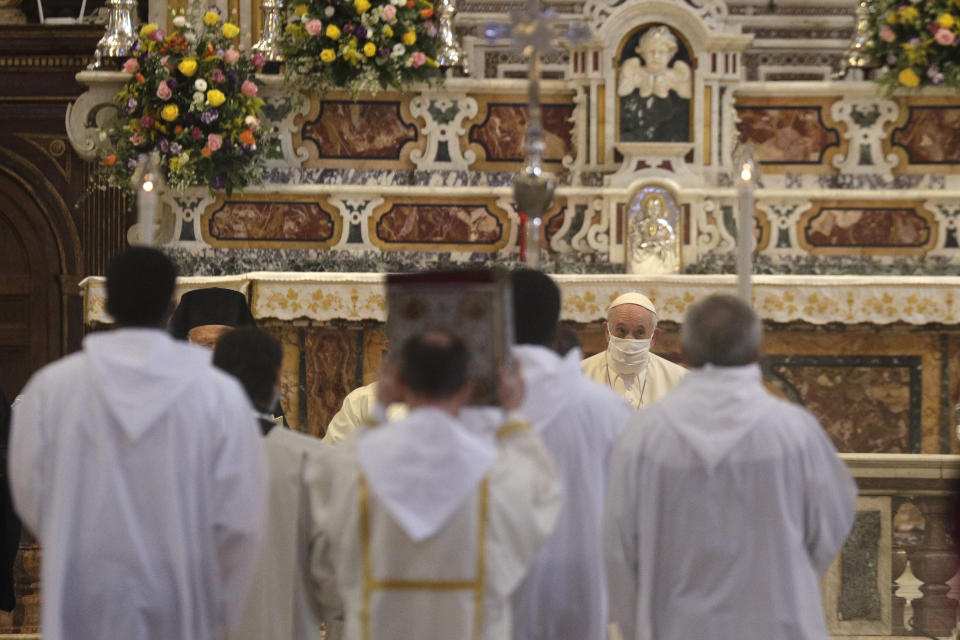 Pope Francis attends a inter-religious ceremony for peace in the Basilica of Santa Maria in Aracoeli, in Rome Tuesday, Oct. 20, 2020 (AP Photo/Gregorio Borgia)