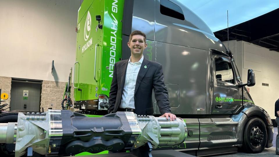 Hyliion CEO Thomas Healy with the Karno fuel-agnostic technology that will be used in the second-generation HyperTruck. (Photo: Alan Adler/FreightWaves)