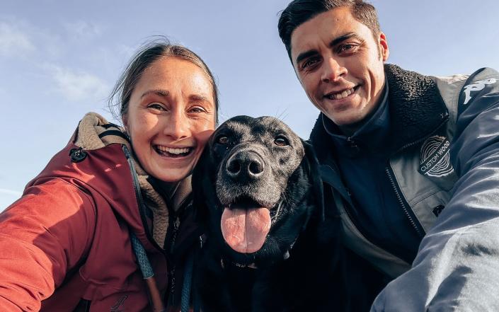 Charlotte and Dale Robson with their Labrador Denzel, who was found by police three days after he was stolen by thieves