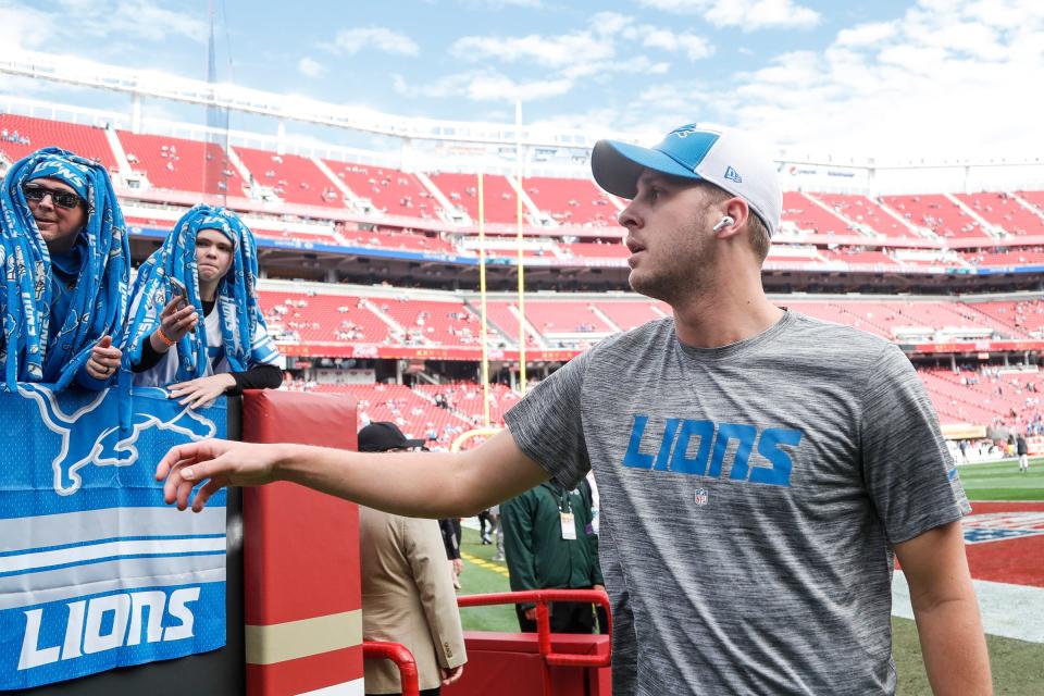 Detroit Lions quarterback Jared Goff waves at fans during warms up before the NFC championship game against San Francisco 49ers at Levi's Stadium in Santa Clara, Calif. on Sunday, Jan. 28, 2024.