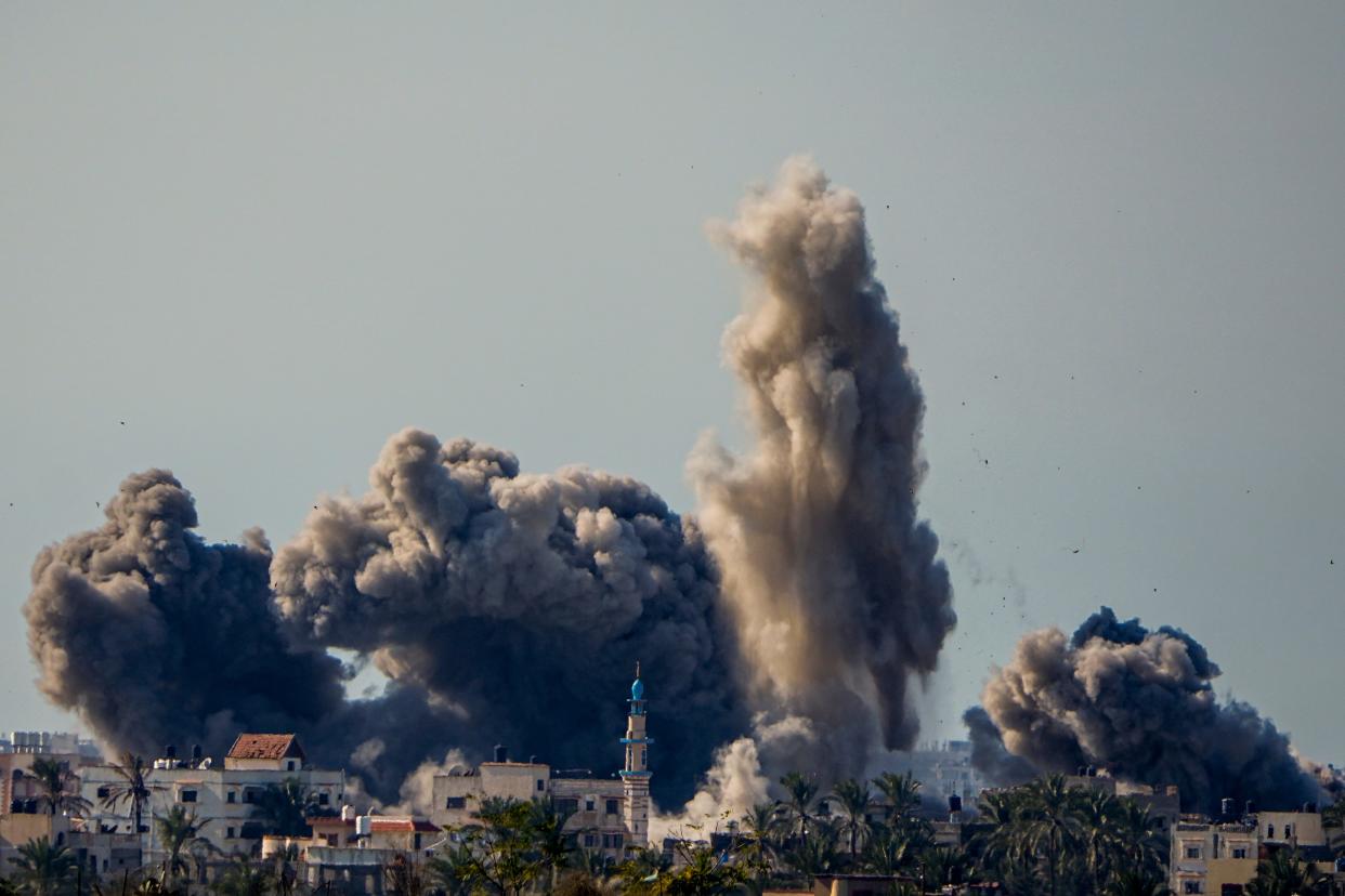 Smoke and explosion following an Israeli bombardment inside the Gaza Strip, as seen from southern Israel, Sunday, Feb. 11, 2024. The army is battling Palestinian militants across Gaza in the war ignited by Hamas' Oct. 7 attack into Israel.