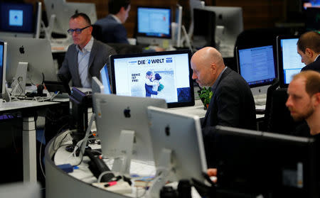 Journalists work in the newsroom of Die Welt in Berlin, Germany, February 16, 2018. REUTERS/Fabrizio Bensch