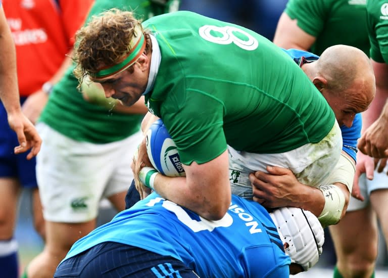 Ireland's Jamie Heaslip (C) will be out for a number of weeks after undergoing a "minor procedure" on his lower back