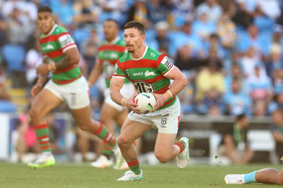 GOLD COAST, AUSTRALIA - JUNE 08: Damien Cook of the Rabbitohs runs the ball during the round 14 NRL match between Gold Coast Titans and South Sydney Rabbitohs at Cbus Super Stadium, on June 08, 2024, in Gold Coast, Australia. (Photo by Chris Hyde/Getty Images)