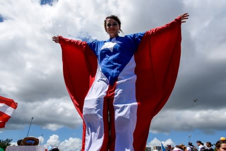 Demonstrator dressed in a costume attends the national strike calling for the resignation of Governor Ricardo Rossello in San Juan