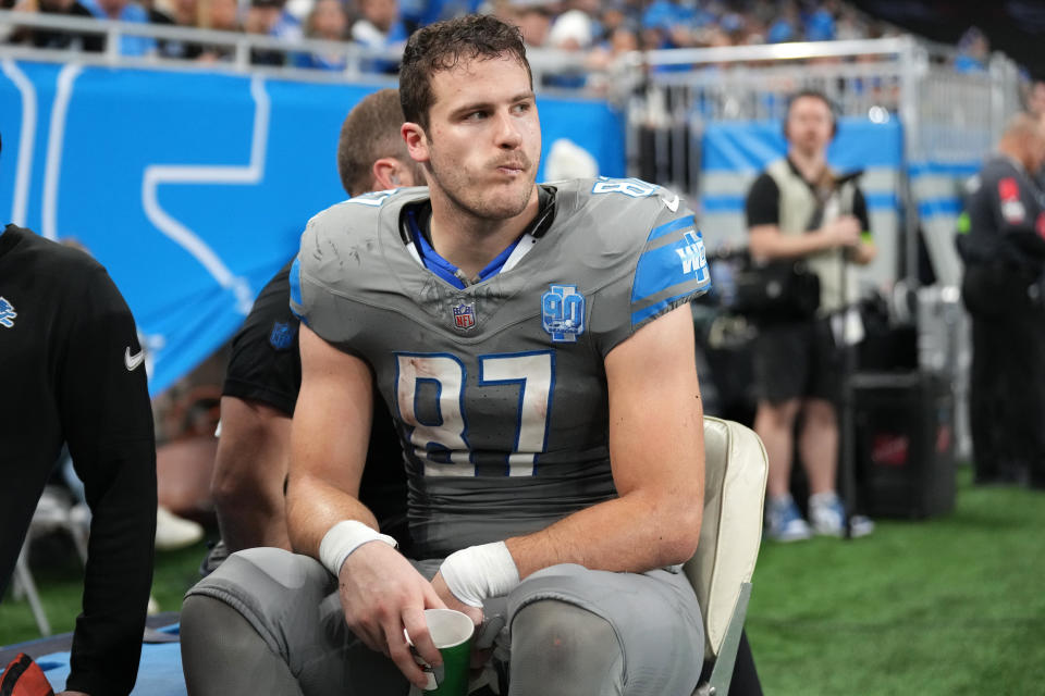 Sam LaPorta leaves Sunday's game on a cart after injuring his knee. (Photo by Nic Antaya/Getty Images)