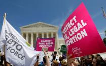 FILE PHOTO: Abortion rights activists rally outside the U.S. Supreme Court in Washington