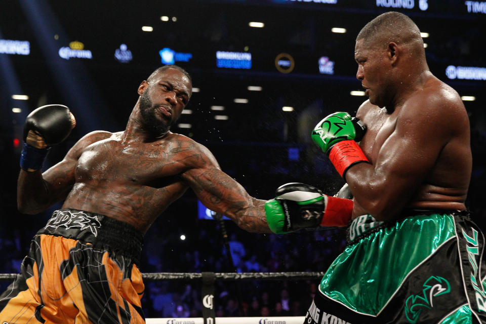 BROOKLYN, NY - MARCH 03: Deontay Wilder (gold/black) defeated Luis Ortiz (green/black) ON MARCH 3, 2018, at the Barclays Center in Brooklyn, NY. (Photo by Edward Diller/Icon Sportswire via Getty Images)