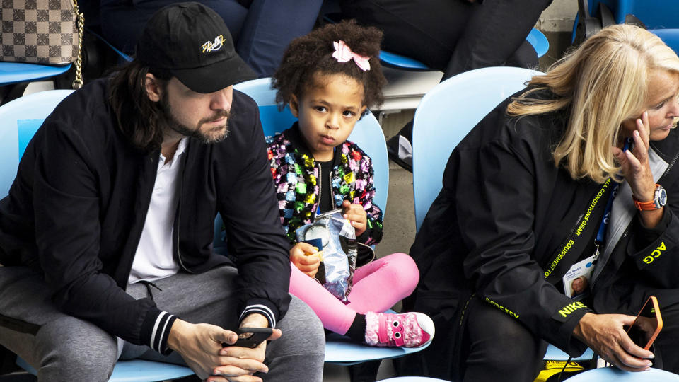 Serena Williams' daughter, pictured here watching her mum in action at Melbourne Park.