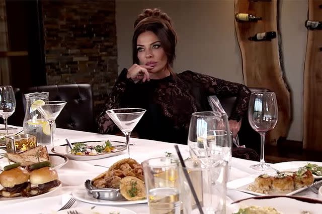 <p>bravo</p> Dolores Catania sitting alone in the 'RHONJ' cold open