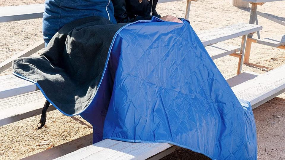 The coated polyester backing of this blanket will protect you from wind and rain.
