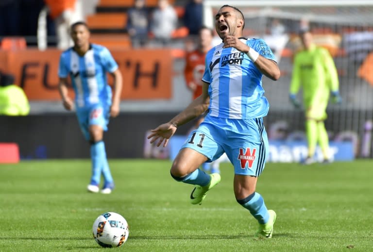 Marseille's French forward Dimitri Payet runs with the ball during the French L1 football match between Lorient and Marseille at the Moustoir stadium in Lorient, western France, on March 5, 2017