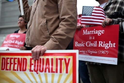 Opponents of Proposition 8, California's anti-gay marriage bill, hold signs outside a US court in San Francisco in February. Six states, including New York, plus the national capital Washington DC have legalized gay marriage