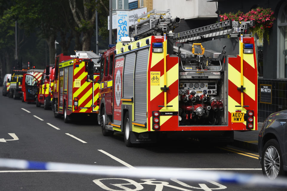 Fire engines at the scene of the fire at a shopping centre in east London (Picture: PA)