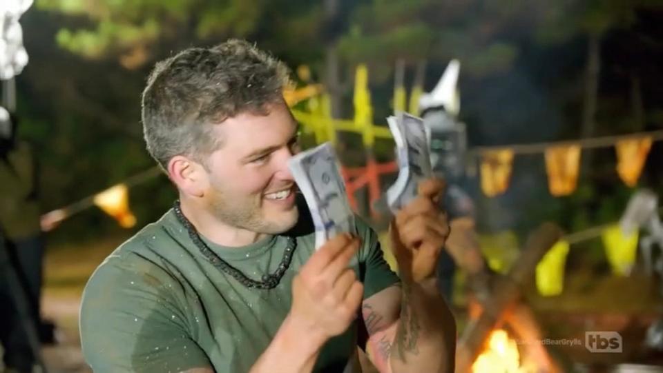 Delaware kickboxer Jonathan McNatt celebrates winning $10,000 on an episode of "I Survived Bear Grylls," which aired Thursday night on TBS.