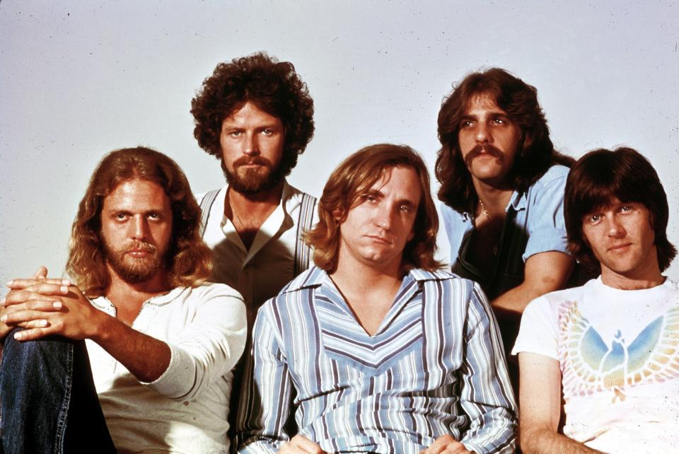 Photo of Glenn FREY and Joe WALSH and Don HENLEY and Don FELDER and EAGLES and Randy MEISNER; L-R: Don Felder, Don Henley, Joe Walsh, Glenn Frey, Randy Meisner - posed, studio, group shot - Hotel California era