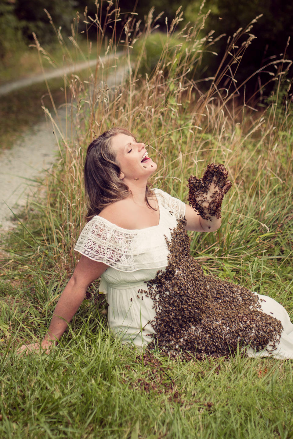 <p>“Then I shook the bees from the hive and they all flew straight to her,” her husband admitted. (Photo: SWNS) </p>