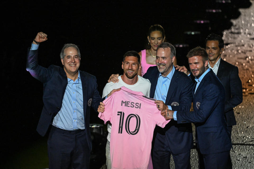 Argentine soccer star Lionel Messi (2nd L) is introduced by (from R) Inter Miami CF owners David Beckham, Jose R. Mas and Jorge Mas as the new Inter Miami CF player of the Major League Soccer, at DRV PNK Stadium in Fort Lauderdale, Florida on July 16, 2023. (Photo by GIORGIO VIERA / AFP) (Photo by GIORGIO VIERA/AFP via Getty Images)