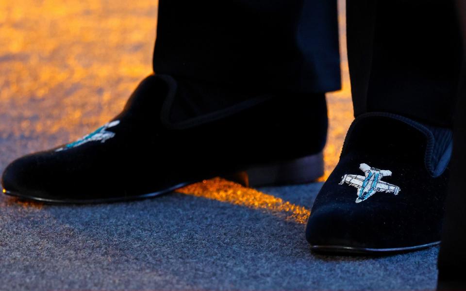 The Duke of Cambridge flying high in his fighter plane-embroidered slippers at the 'Top Gun: Maverick' on Thursday - Max Mumby/Indigo