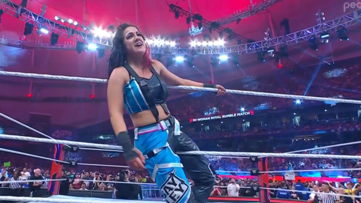  Bayley celebrating between the ropes after winning The Royal Rumble. 