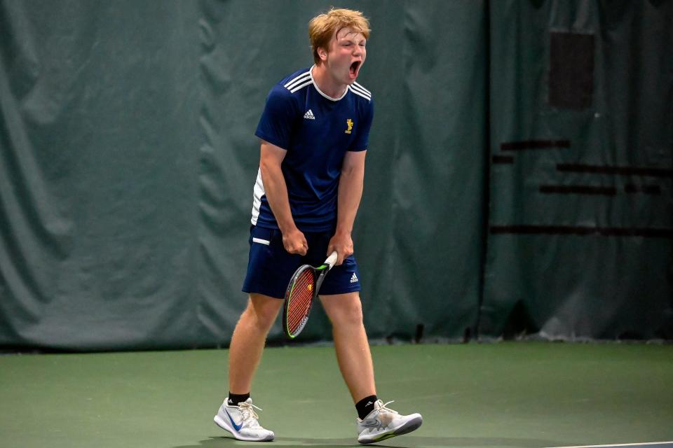 Rapid City Christian's Noah Greni celebrates his match point over Yankton's Gage Becker for the No. 1 singles title on day two of the Class A state tournament on Tuesday at the Tennis Center of the Black Hills.