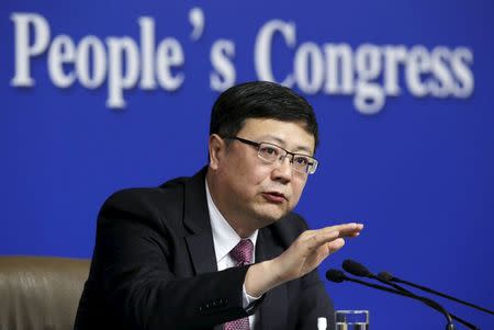 Chen Jining, Minister of Environmental Protection, gestures as he answers a question at a news conference on the sidelines of the National People's Congress (NPC) in Beijing, China, March 11, 2016. REUTERS/Jason Lee