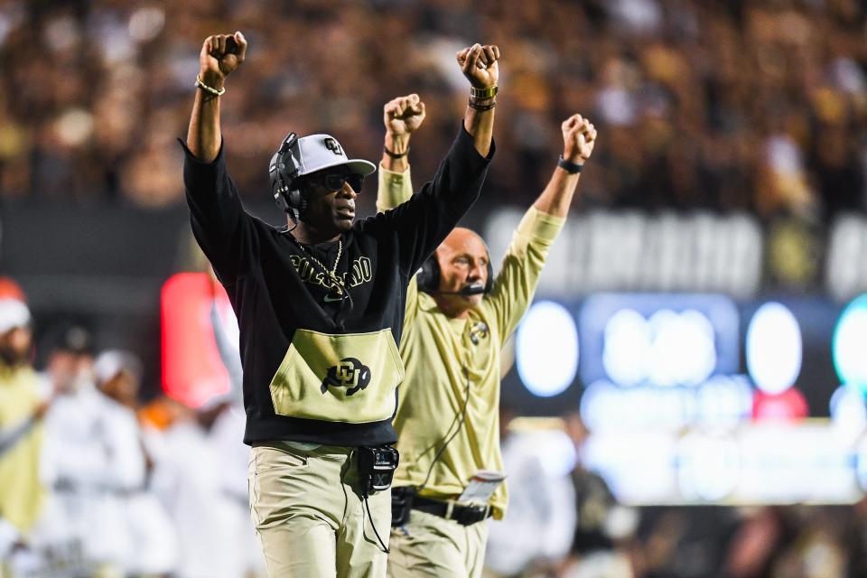 Colorado head coach Deion Sanders celebrates a play during last weekend's game against Colorado State.