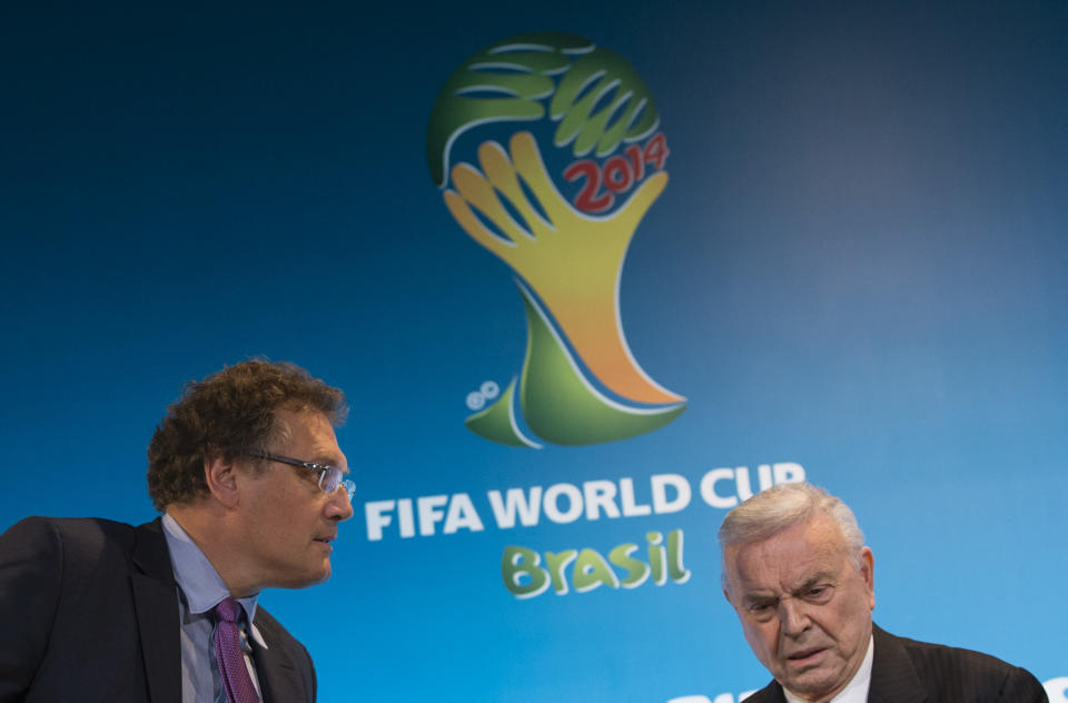 FIFA Secretary General Jerome Valcke, left, and President of Brazilian Soccer Confederation Jose Maria Marin arrive for a news conference at the Maracana stadium in Rio de Janeiro, Brazil, Thursday, March 27, 2014. (AP Photo/Felipe Dana)