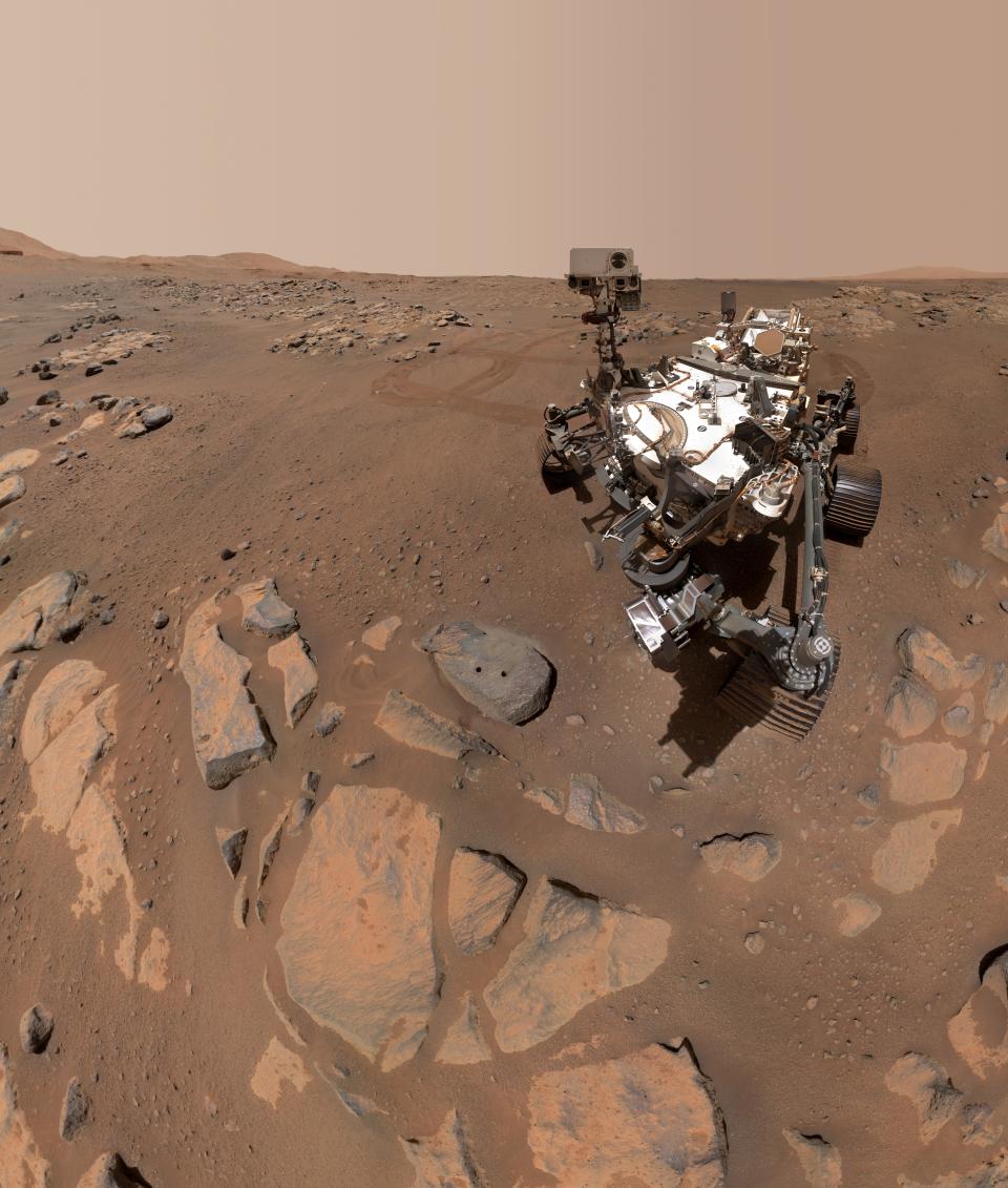 Perseverance took a selfie next to its biggest achievement yet: the two small boreholes where the rover sampled rocks on Mars.