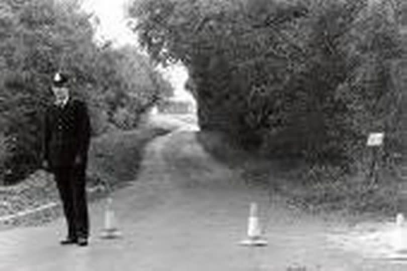 A police officer at the scene following Colette's murder in 1983