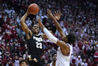 Purdue's Jaden Ivey (23) goes to the basket against Indiana's Michael Durr (2) during the first half of an NCAA college basketball game Thursday, Jan. 20, 2022, in Bloomington, Ind. (Darron Cummings)