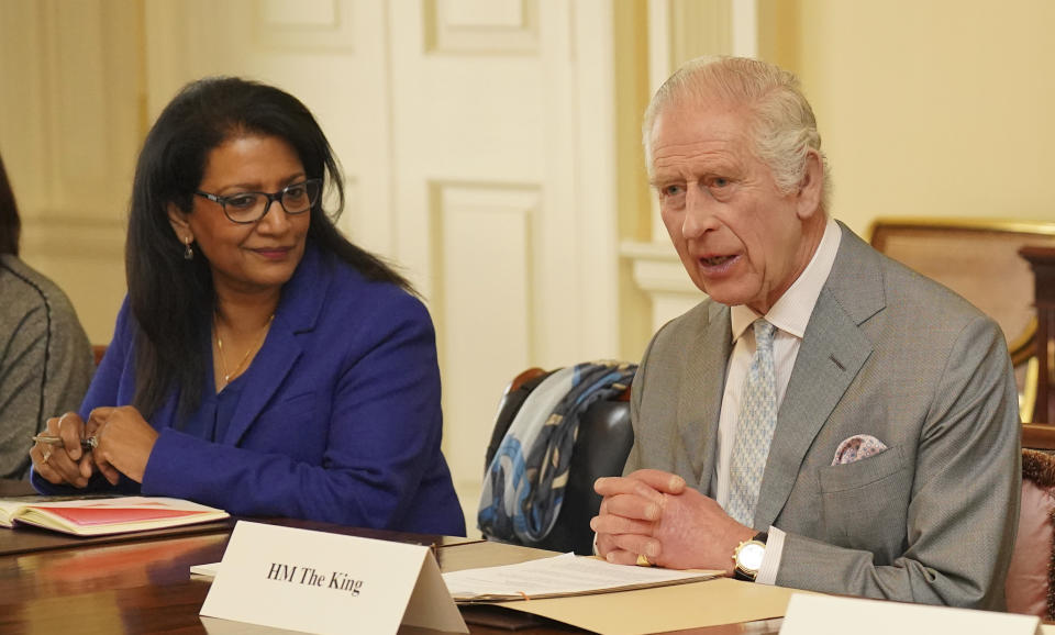 Britain's King Charles III, right, speaks during an audience in the Billiard Room at Buckingham Palace, London, on Tuesday March 26, 2024 with community faith leaders from across the UK who have taken part in a Windsor Leadership Trust programme, encouraging and supporting dialogue, harmony and understanding at a time of heightened international tension. (Jonathan Brady, Pool Photo via AP)