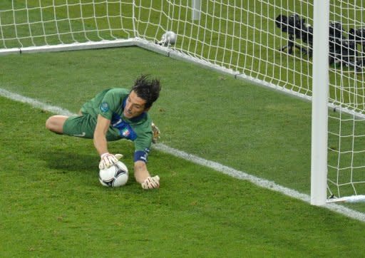 Gianluigi Buffon saves Ashley Cole's attempt in the penalty shootout between England and Italy after their goalless Euro 2012 quarter-final. Former England striker Michael Owen led calls for an overhaul of the country's coaching on Monday after another major tournament campaign ended in disappointment