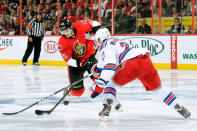 OTTAWA, CANADA - APRIL 18: Erik Karlsson #65 of the Ottawa Senators shoots the puck in front of Ryan McDonagh #27 of the New York Rangers in Game Four of the Eastern Conference Quarterfinals during the 2012 NHL Stanley Cup Playoffs at the Scotiabank Place on April 18, 2012 in Ottawa, Ontario, Canada. (Photo by Richard Wolowicz/Getty Images)