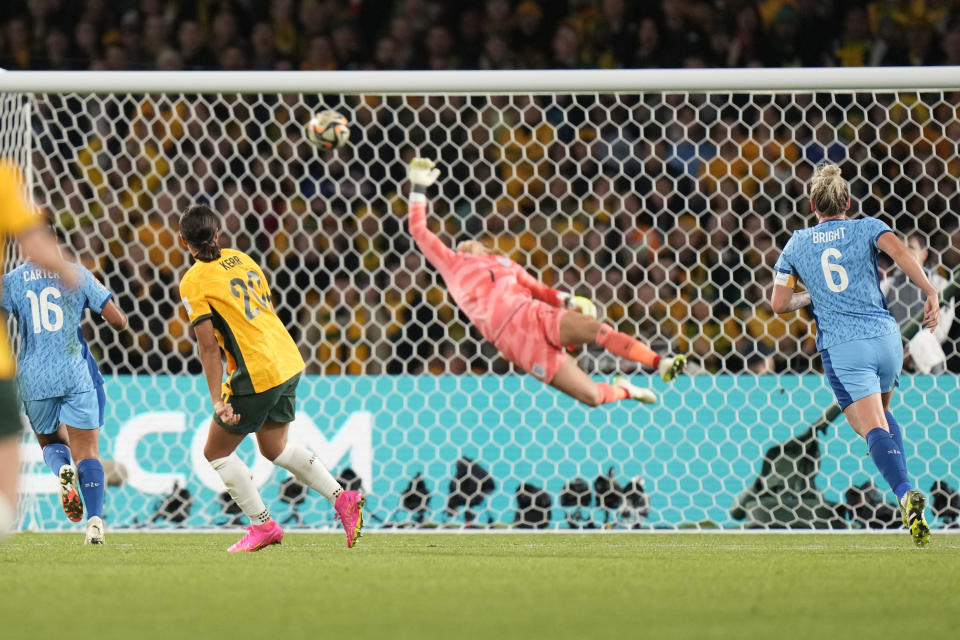 Australia's Sam Kerr scores her side's opening goal during the Women's World Cup semifinal soccer match between Australia and England at Stadium Australia in Sydney, Australia, Wednesday, Aug. 16, 2023. (AP Photo/Alessandra Tarantino)