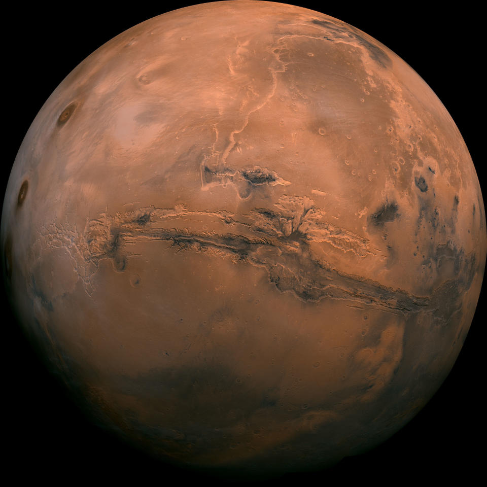 FILE - This image made available by NASA shows the planet Mars. This composite photo was created from over 100 images of Mars taken by Viking Orbiters in the 1970s. NASA is underestimating the amount of time and money it will take to bring Mars rocks back to Earth in the coming decade, an independent panel said Tuesday, Nov. 10, 2020. (NASA via AP)