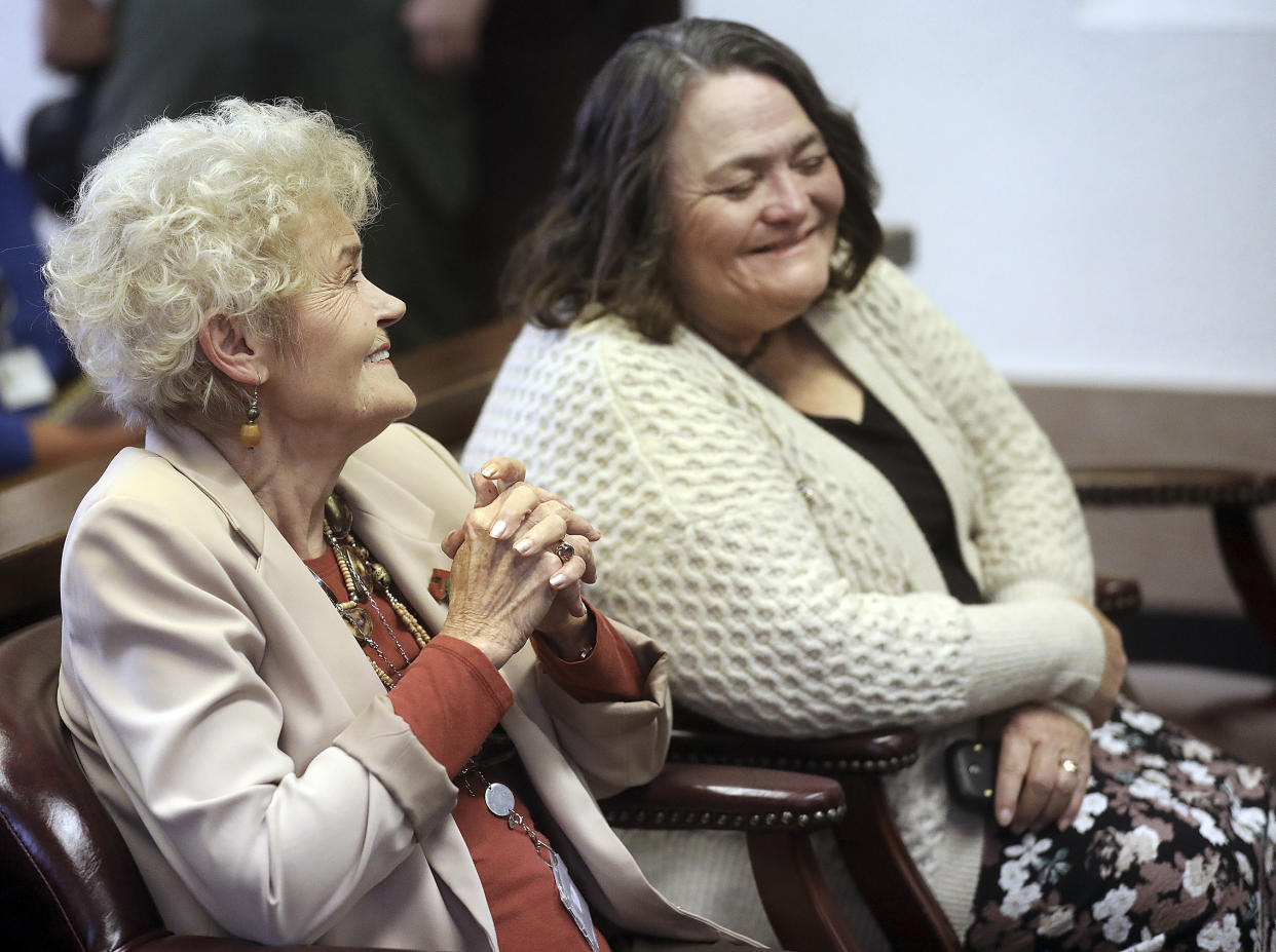 District 2 Supervisor and county board of supervisors chair Ann English, left, and District 3 Representative Peggy Judd sit in the Cochise County Superior Courtroom prior to the board's election certification, Thursday, Dec. 1, 2022. (Mark Levy/Herald Review via AP, Pool)