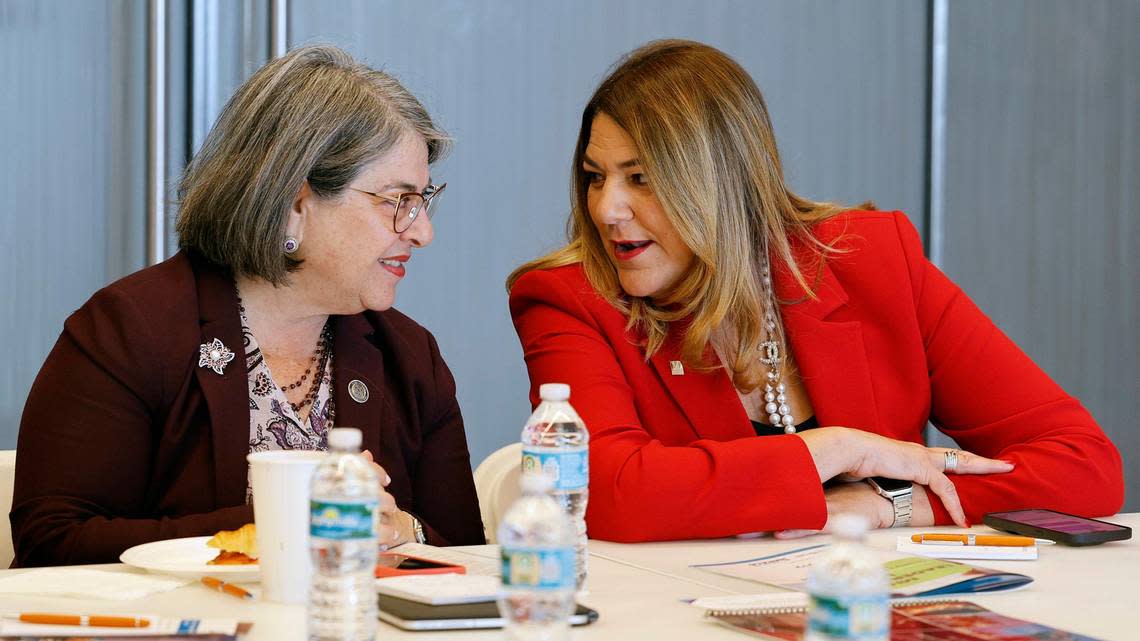 Miami-Dade County Mayor Daniella Levine Cava and Miami-Dade College President Madeleine Pumariega, left to right, speak with each other during the Miami Leadership Local conference at Bilzen Sumberg in Miami on Friday, October 27, 2023. Al Diaz/adiaz@miamiherald.com