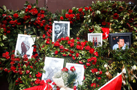 FILE PHOTO: Flowers and pictures of the victims are placed near the entrance of Reina nightclub in Istanbul, Turkey, January 17, 2017. REUTERS/Osman Orsal/File Photo