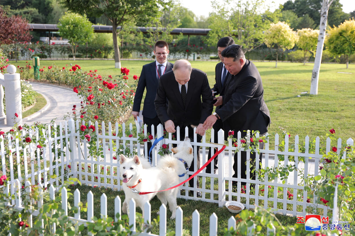 Vladimir Putin and Kim Jong Un in the garden of the Kumsusan Guesthouse