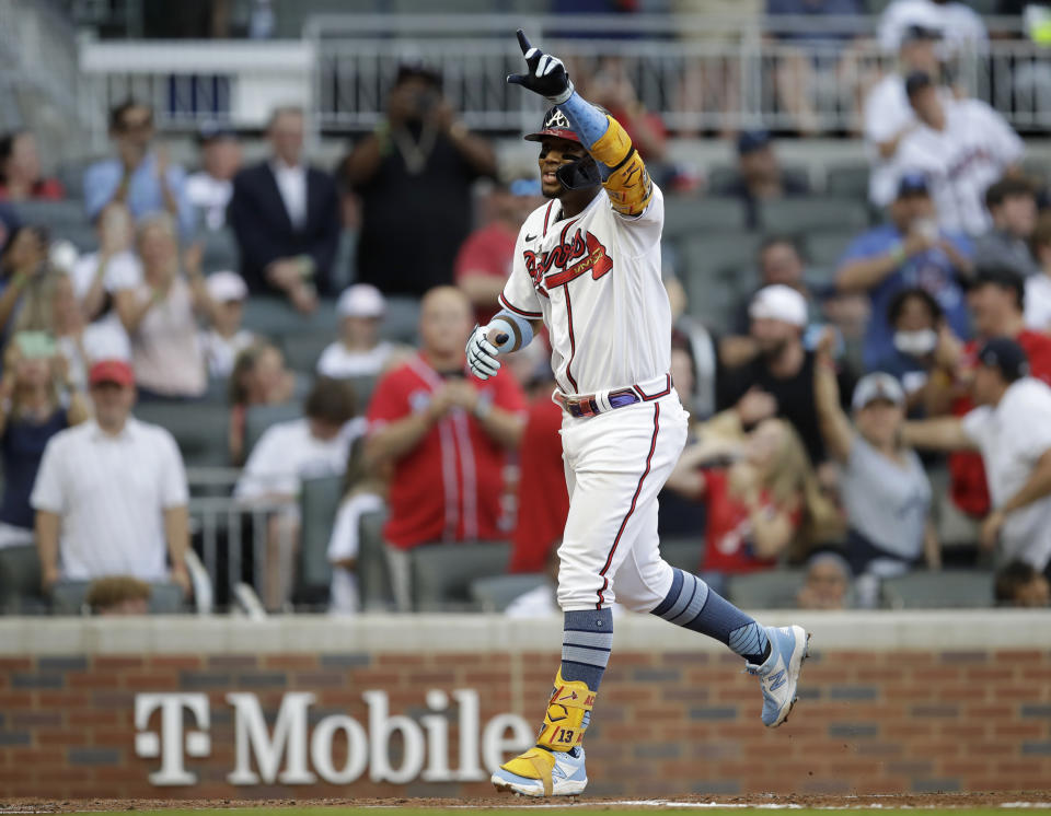 Atlanta Braves' Ronald Acuna Jr. celebrates after hitting a home run off St. Louis Cardinals pitcher Kwang Hyun Kim in the third inning of the second baseball game of a doubleheader on Sunday, June 20, 2021, in Atlanta. (AP Photo/Ben Margot)