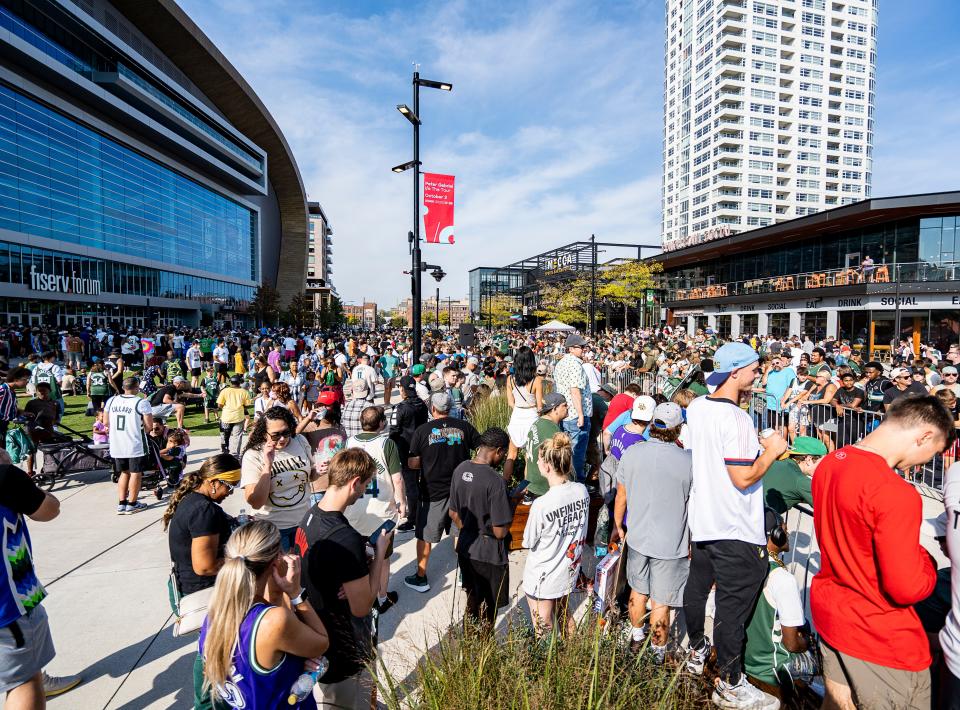 Fans wait in anticipation to see point guard Damian Lillard at the Milwaukee Bucks welcome rally for the newest Bucks player on Saturday September 30, 2023 at the Fiserv Forum plaza in Milwaukee, Wis.