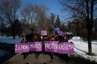 <p>Activists hold a banner that reads “Women’s March against Fascism” during the Women’s March rally in Belgrade, Serbia, Saturday, Jan. 21, 2017. The march was held in solidarity with the Women’s March on Washington, advocating women’s rights and opposing Donald Trump’s presidency. (AP Photo/Darko Vojinovic) </p>