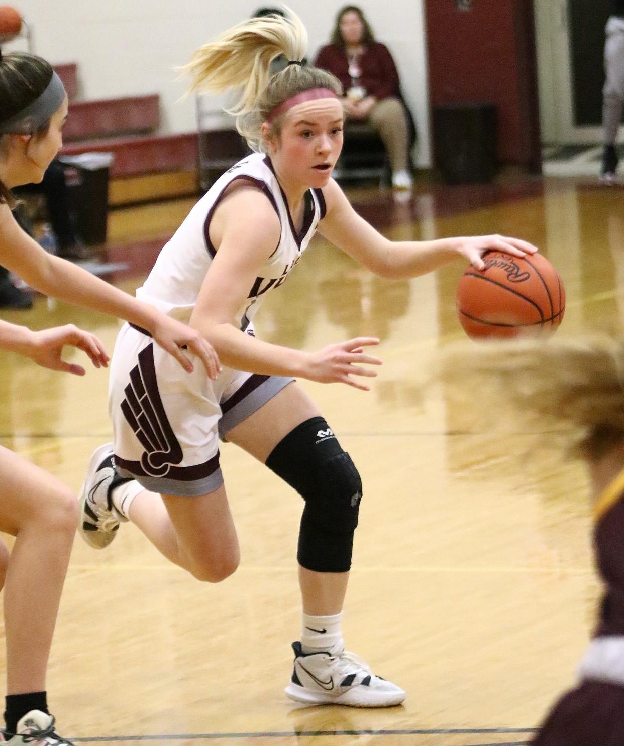 Waterloo's Rose Couts with the ball against South Range during tournament action at Waterloo High School Saturday, February 19, 2022.