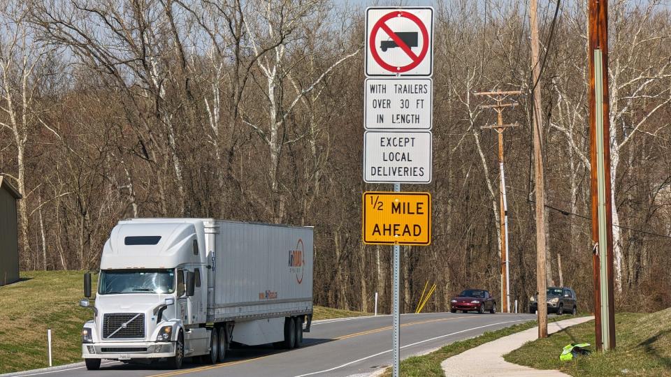 A truck travels along Locust Point Road with a 30-foot length restriction one-half mile ahead in East Manchester Township as it crosses over from Conewago Township on March 14, 2024.