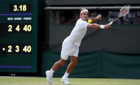 Tennis - Wimbledon - All England Lawn Tennis and Croquet Club, London, Britain - July 11, 2018. Switzerland's Roger Federer in action during his quarter final match against South Africa's Kevin Anderson. REUTERS/Andrew Boyers