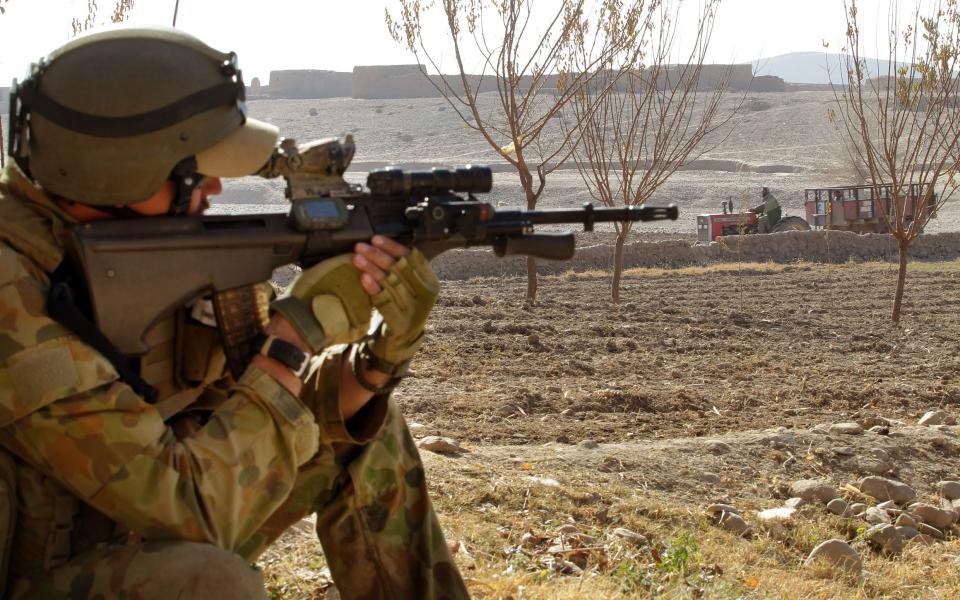 Australian and Afghan National Army search a village at Musazai in the Uruzgan Province in Afghanistan