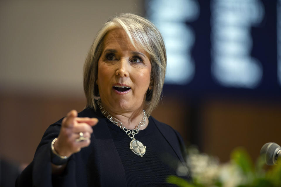 New Mexico Gov. Michelle Lujan Grisham delivers her State of the State address at the opening day of an annual legislative session in the House of Representatives in Santa Fe, N.M., on Tuesday, Jan. 17, 2023. Lujan Grisham called for new gun control laws and greater accountability for firearms manufacturers while denouncing recent drive-by shootings against state legislators and a national "scourge" of violence. (AP Photo/Andres Leighton)