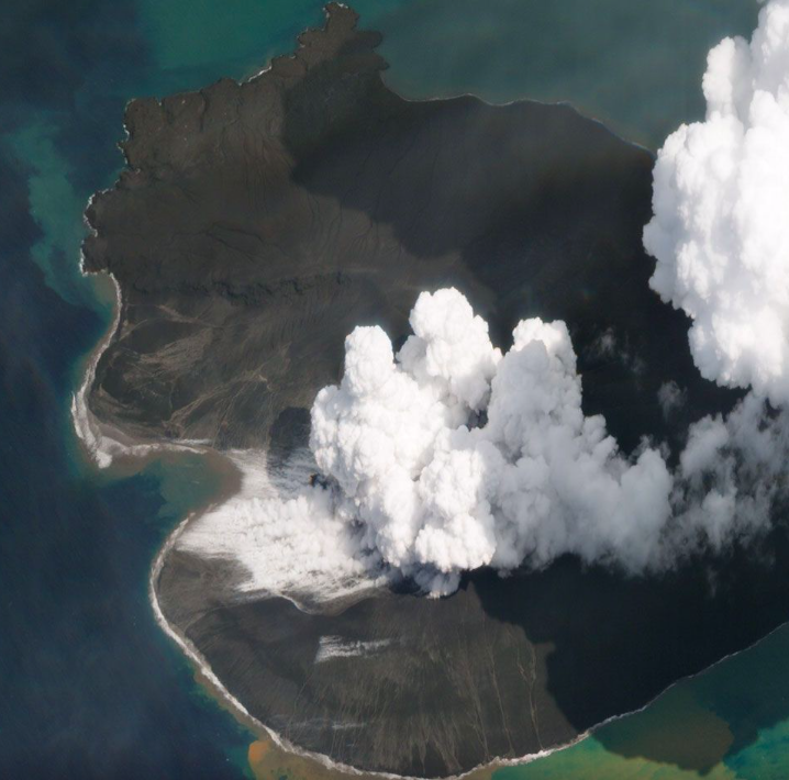 <em>Smoke pours out of the volcano at the start of 2019 (Planet Labs Inc)</em>